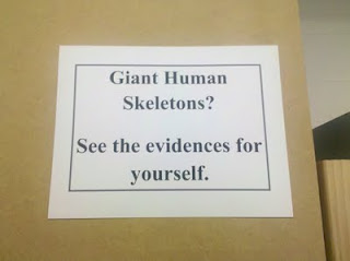 Sign reads: Giant Human Skeletons? See the evidences for yourself.